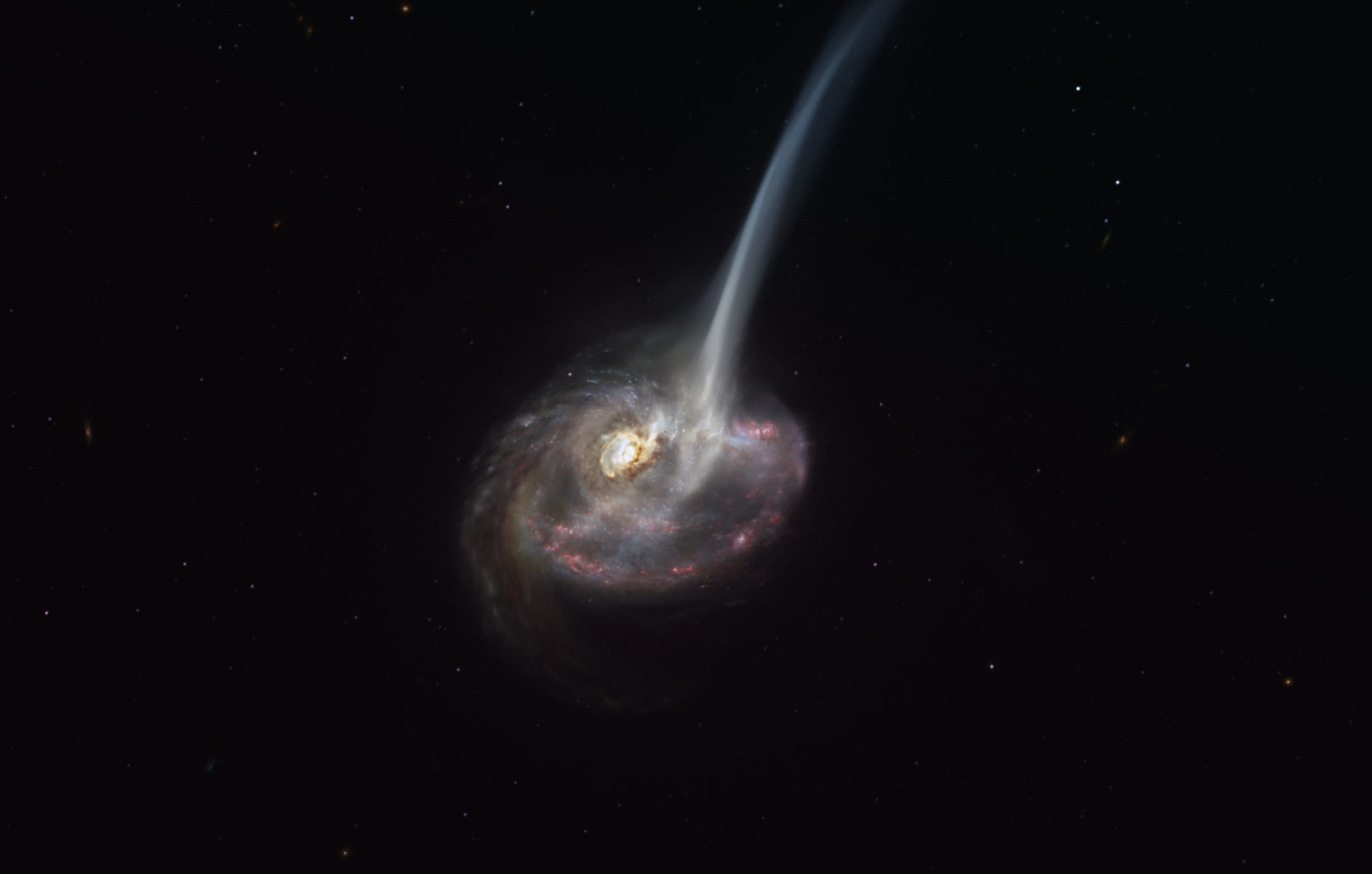 大量のガスを放出している遠方銀河「ID2299」。放出されるガスが尾のような構造を見せている。