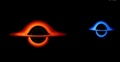 2つの超大質量ブラックホール。赤は太陽の2億倍、青はその半分の質量のブラックホールを表している。