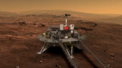 火星探査車「祝融号」を下ろす着陸船の様子を描いたイメージ画像
